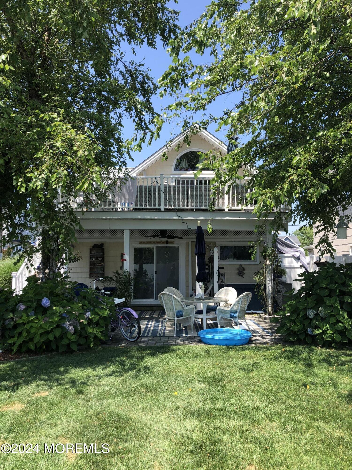 14 Cook Street, Unit DOWNSTAIRS Monmouth Beach, NJ 07750 - Photo 28 of 33 a front view of a house with garden