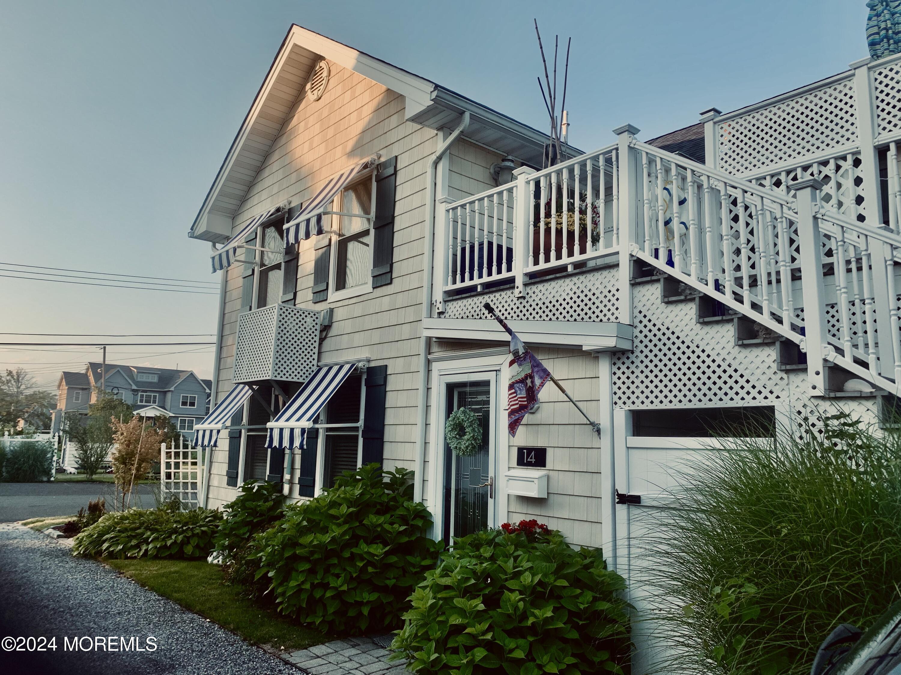 14 Cook Street, Unit DOWNSTAIRS Monmouth Beach, NJ 07750 - Photo 33 of 33 a front view of a house with balcony