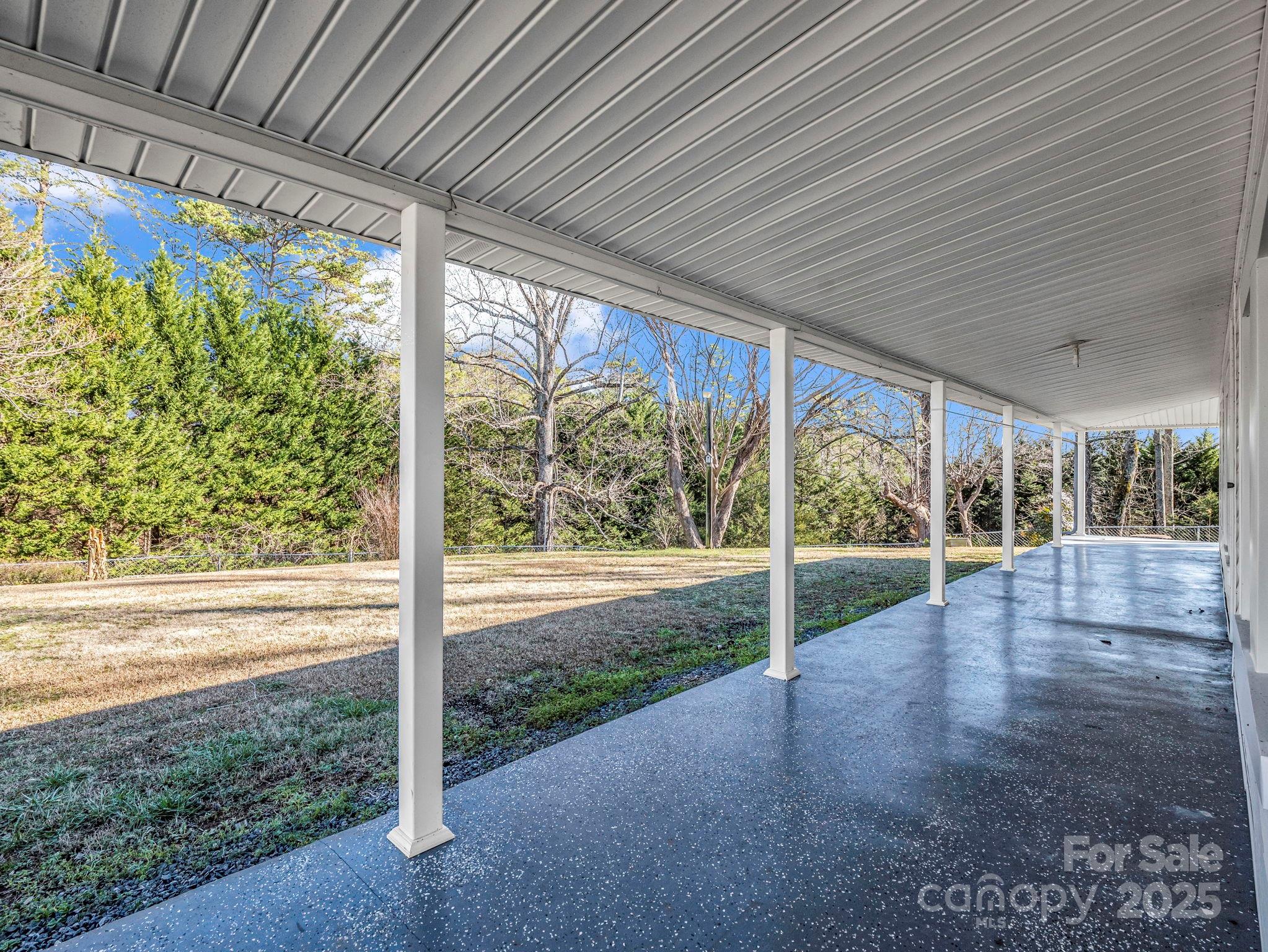 620 Smith Waldrop Road Columbus, NC 28722 - Photo 15 of 42 a view of porch with a garden