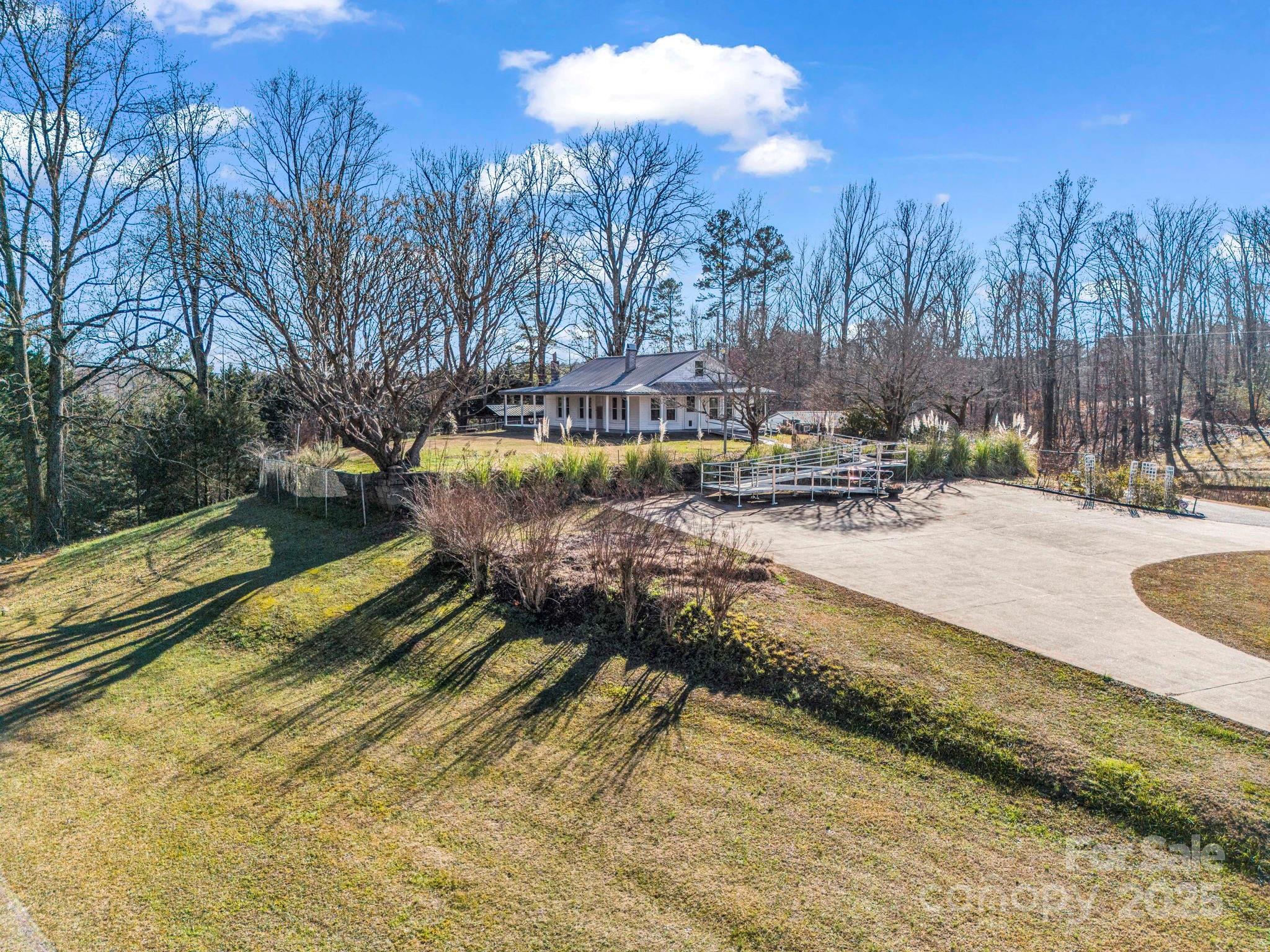 620 Smith Waldrop Road Columbus, NC 28722 - Photo 22 of 42 a view of a backyard with swimming pool