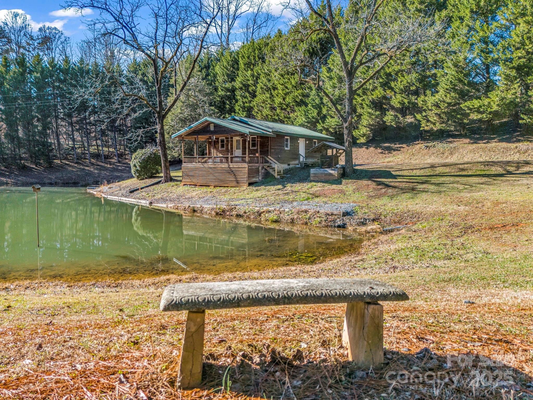 620 Smith Waldrop Road Columbus, NC 28722 - Photo 28 of 42 a front view of a house with a yard