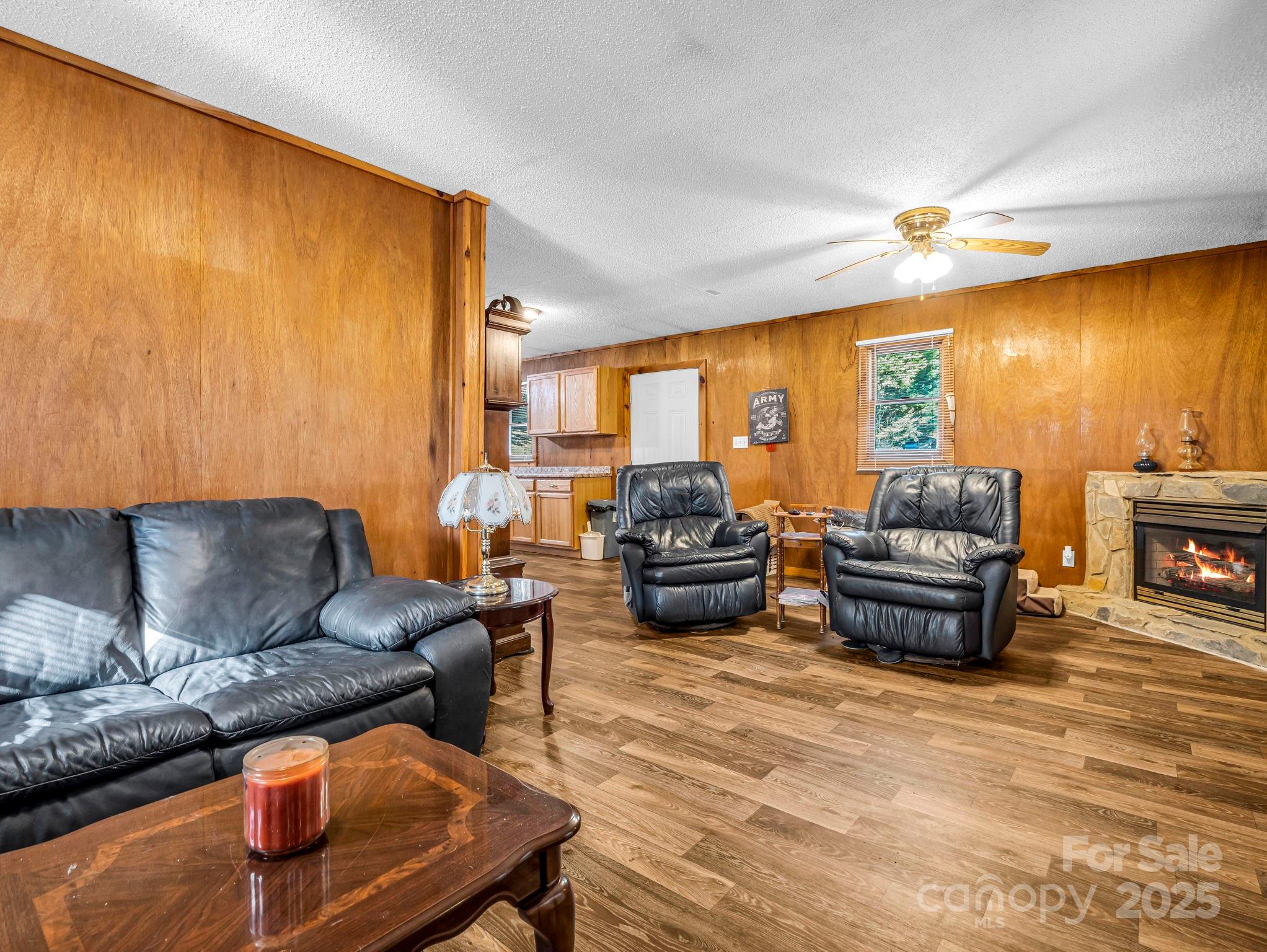 620 Smith Waldrop Road Columbus, NC 28722 - Photo 31 of 42 a living room with furniture and a flat screen tv