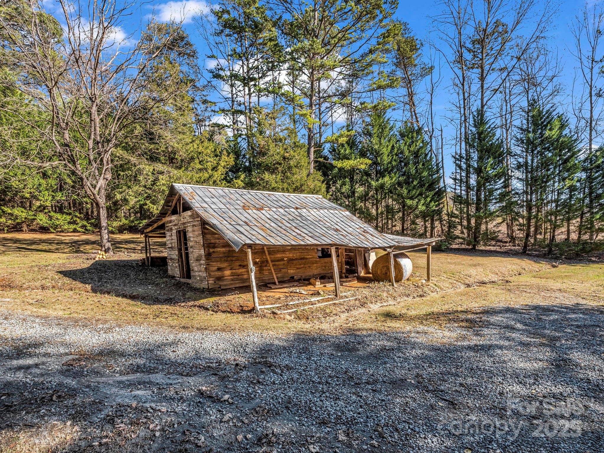 620 Smith Waldrop Road Columbus, NC 28722 - Photo 34 of 42 a view of a house with backyard