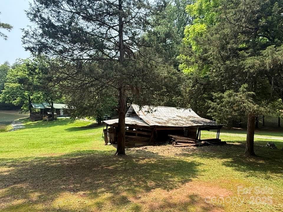 620 Smith Waldrop Road Columbus, NC 28722 - Photo 37 of 42 a view of a garden with swimming pool