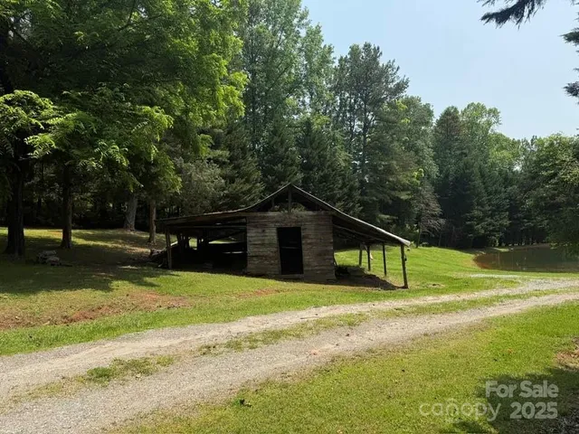 a house with trees in the background