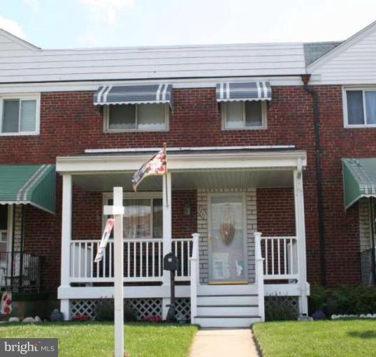 7811 Harold Road Dundalk, MD 21222 - Photo 1 of 10 front view of a house with a yard