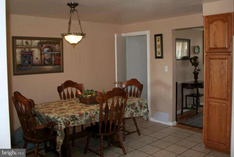 7811 Harold Road Dundalk, MD 21222 - Photo 10 of 10 a view of a dining room with furniture