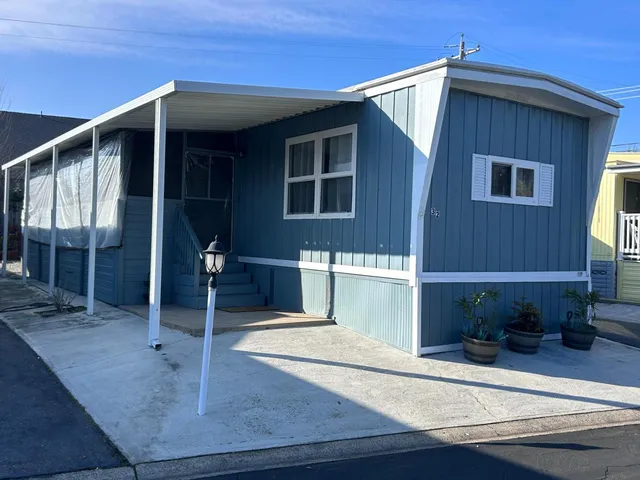 a view of house with patio