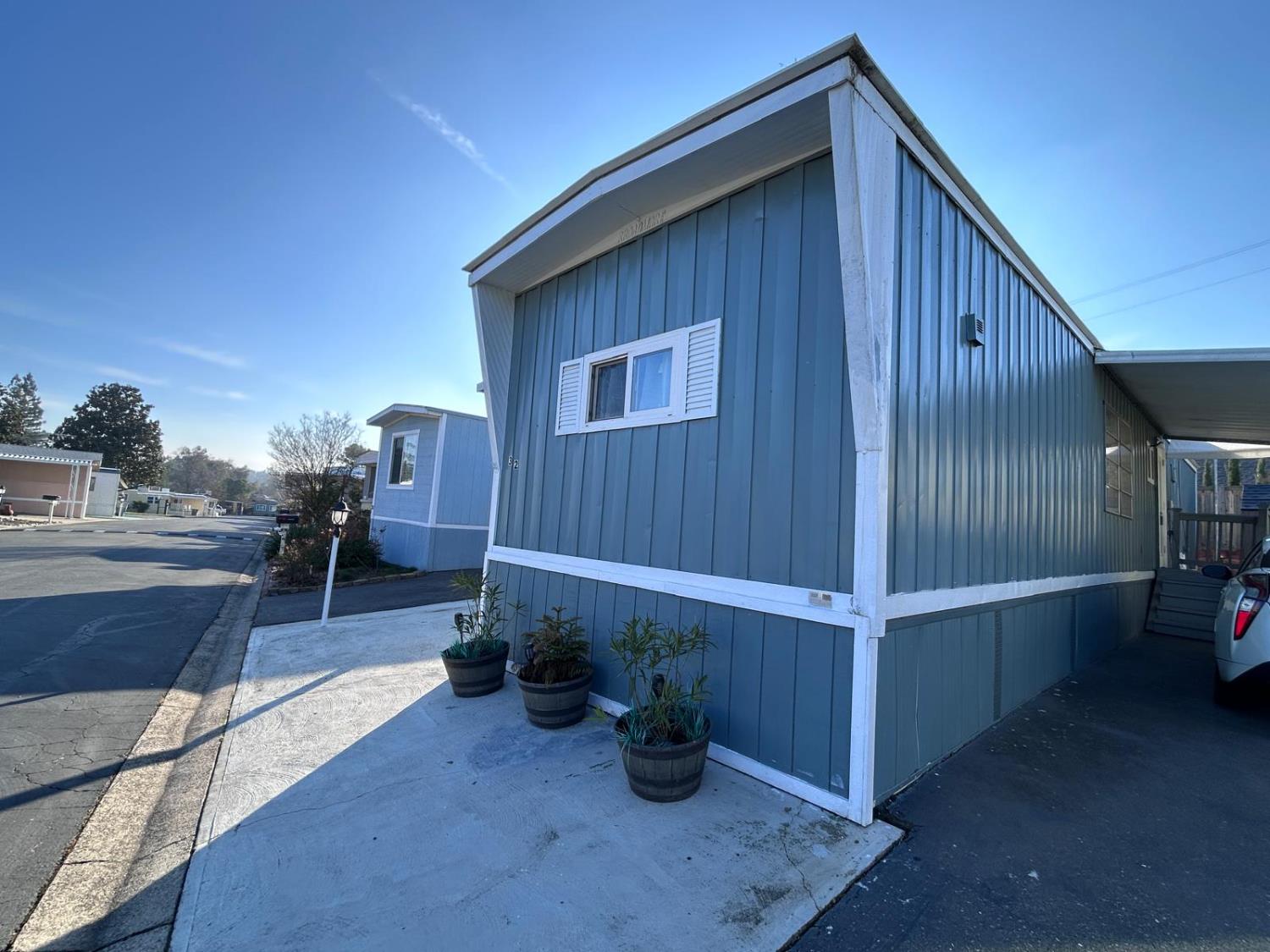 9060 Auburn Folsom Road, Unit 32 Granite Bay, CA 95746 - Photo 2 of 18 a view of backyard of house