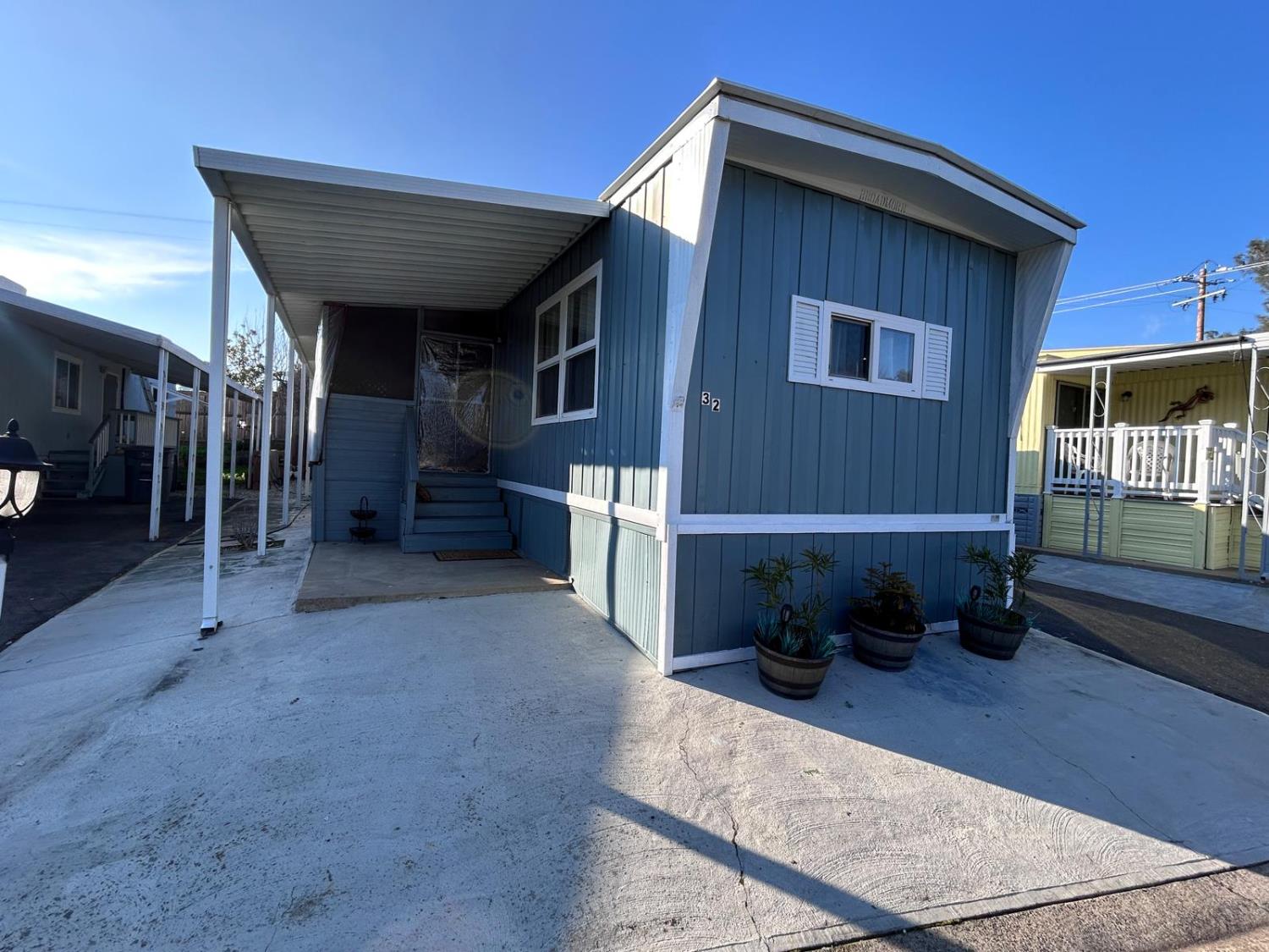 9060 Auburn Folsom Road, Unit 32 Granite Bay, CA 95746 - Photo 4 of 18 a view of a house with a yard