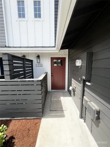 a black and white building with a outdoor space