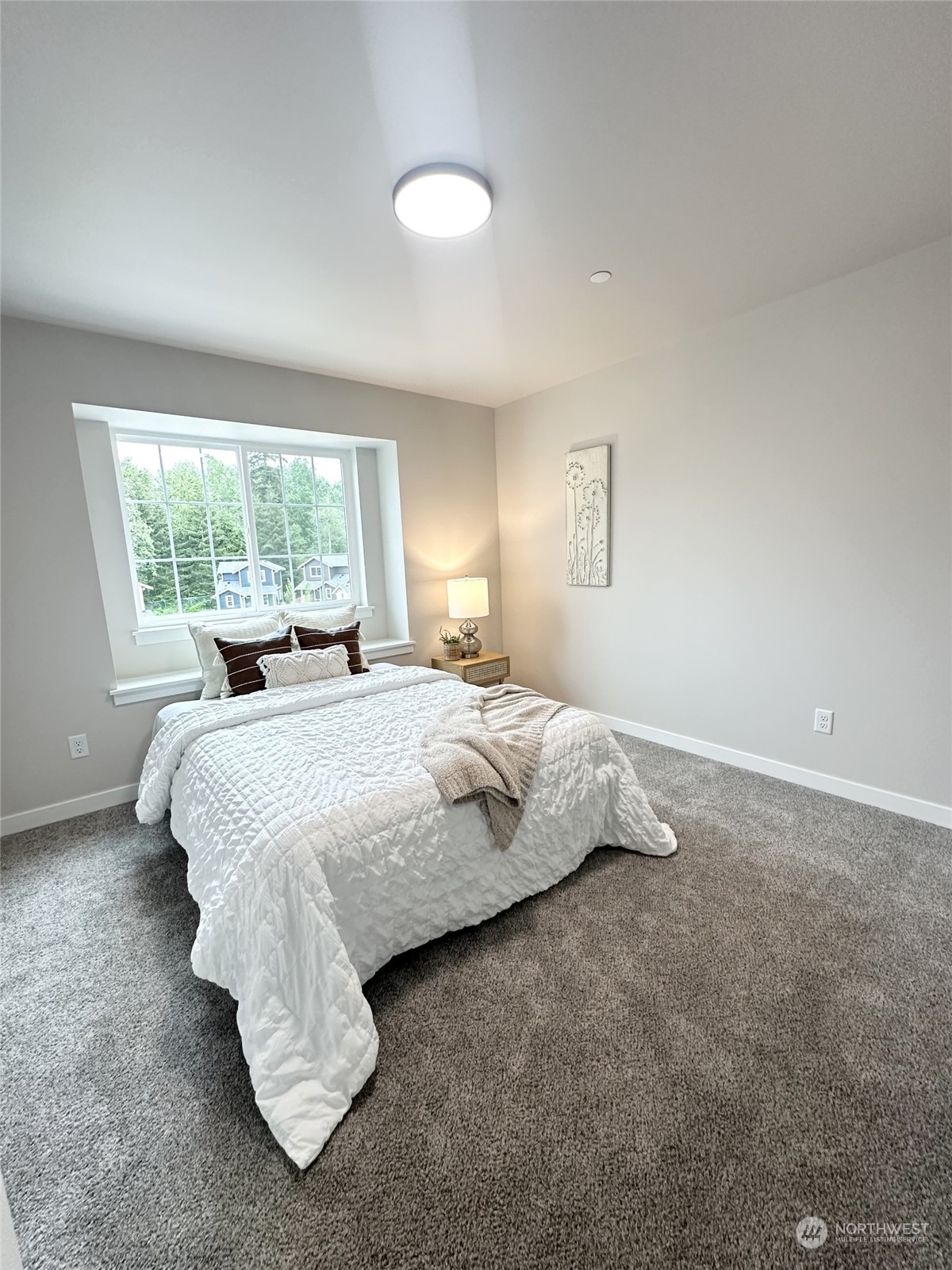 1733 Sunup Loop Bellingham, WA 98226 - Photo 14 of 16 a bedroom with a bed and window