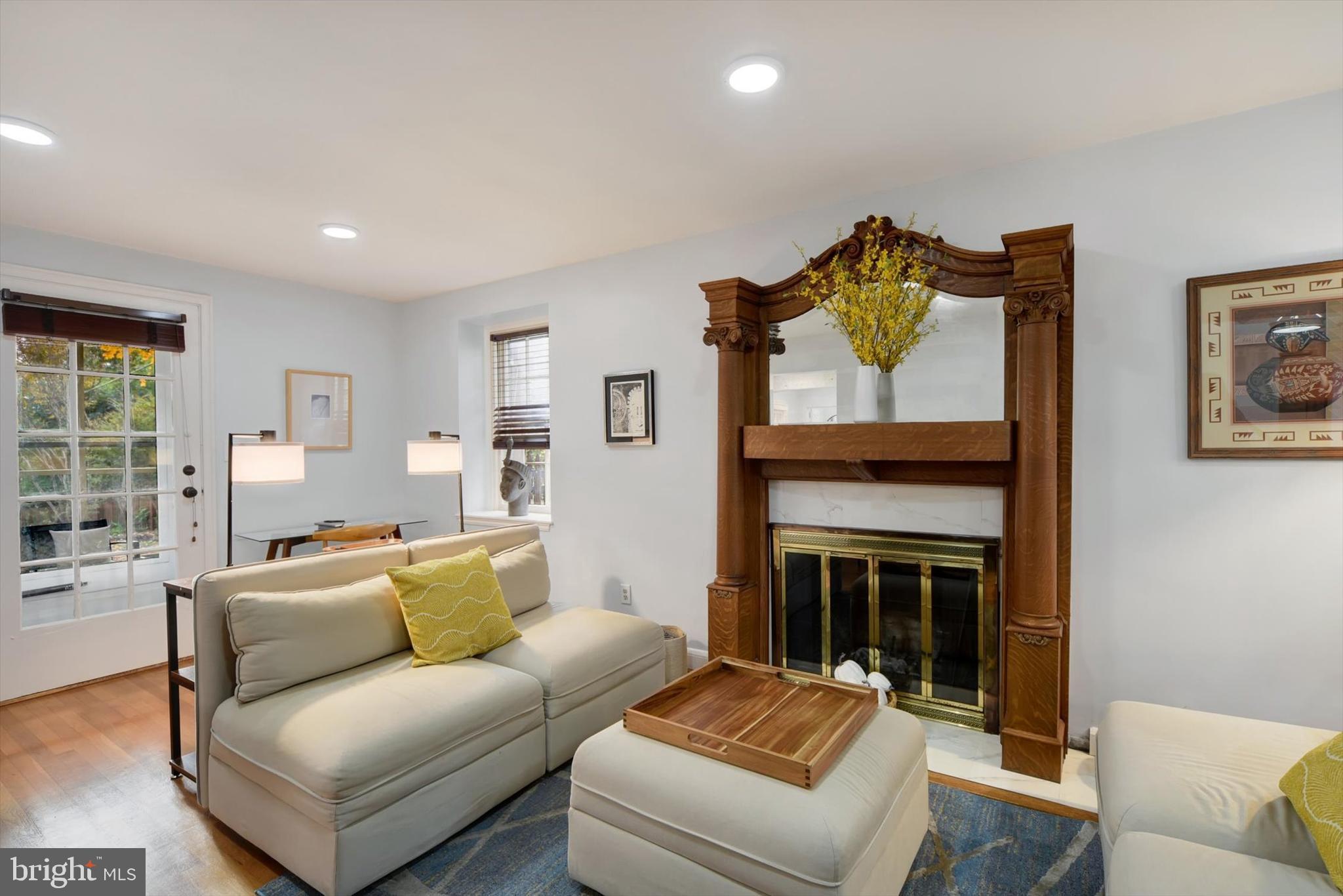 1219 Southview Road Baltimore, MD 21218 - Photo 11 of 39 a living room with furniture and a fireplace