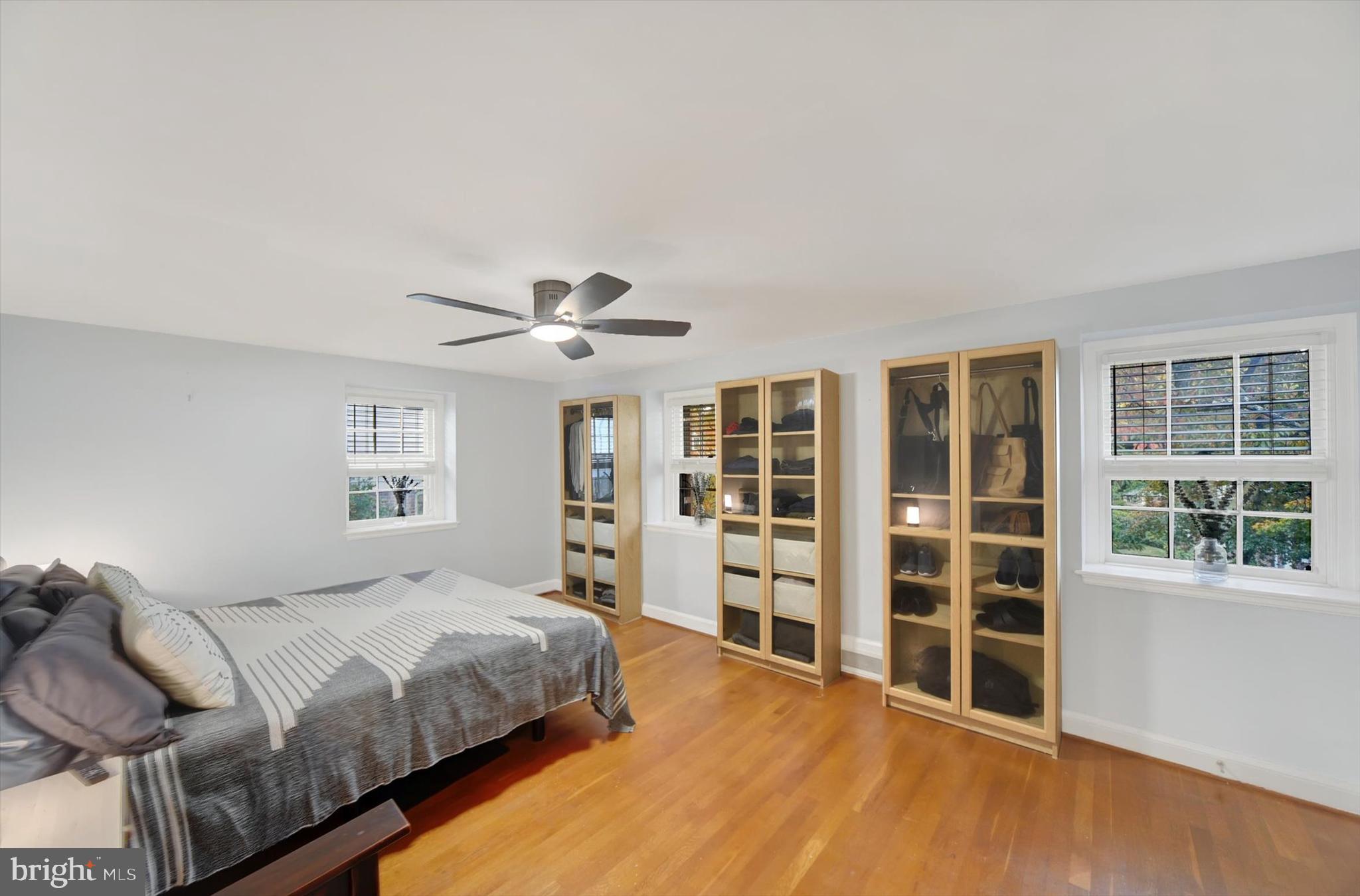 1219 Southview Road Baltimore, MD 21218 - Photo 27 of 39 a bedroom with a large bed and windows