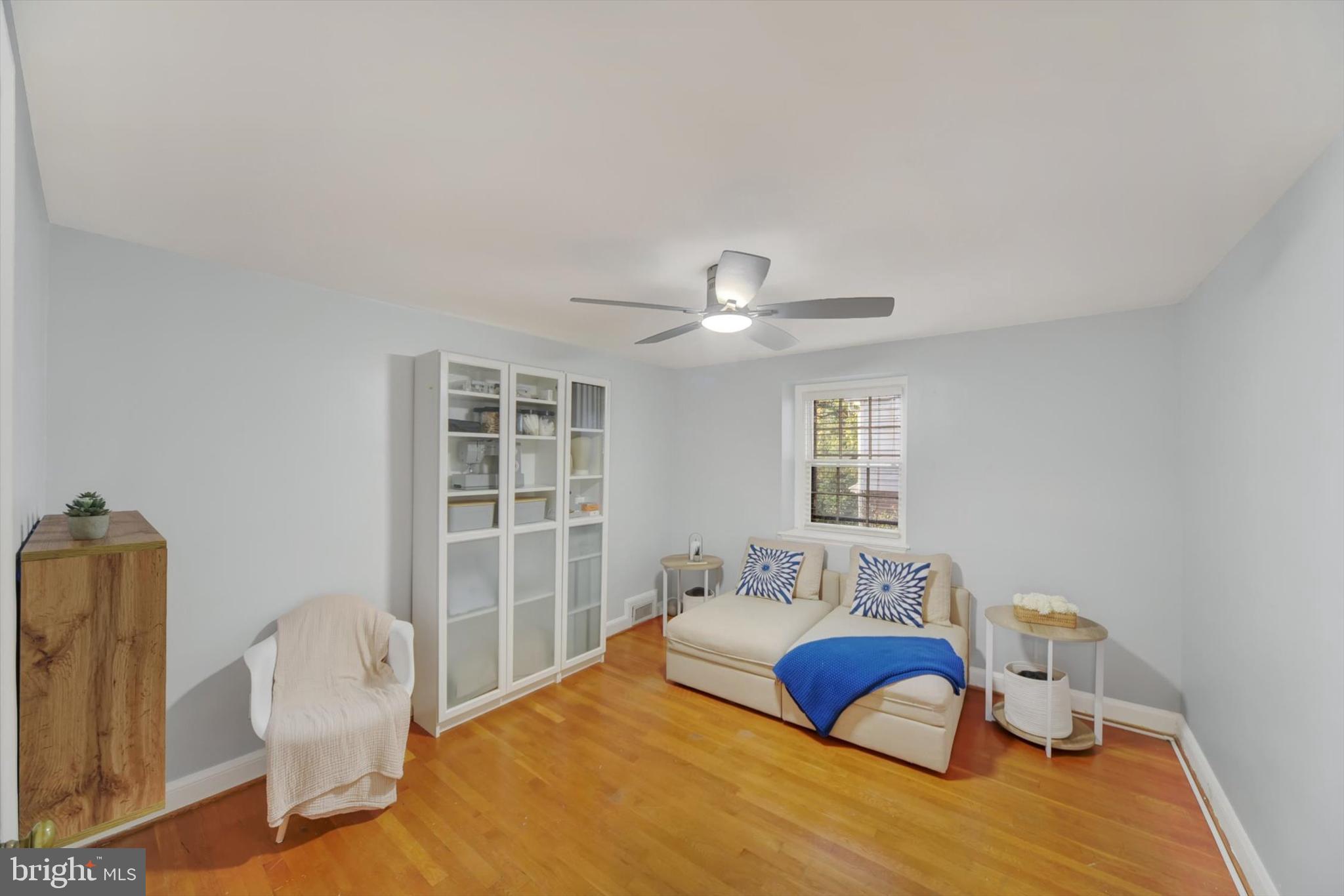 1219 Southview Road Baltimore, MD 21218 - Photo 30 of 39 a bedroom with a bed and window