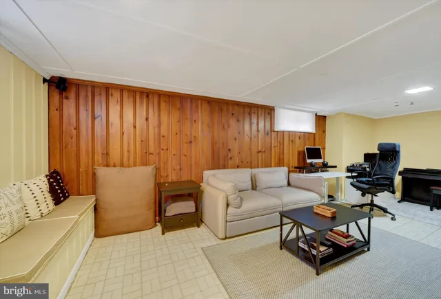 a living room with furniture and a couch