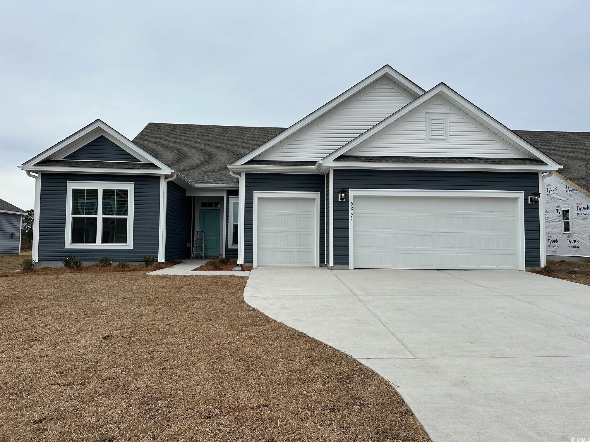 5223 Lucy Way Myrtle Beach, SC 29579 - Photo 1 of 27 View of front of property with a front yard and a