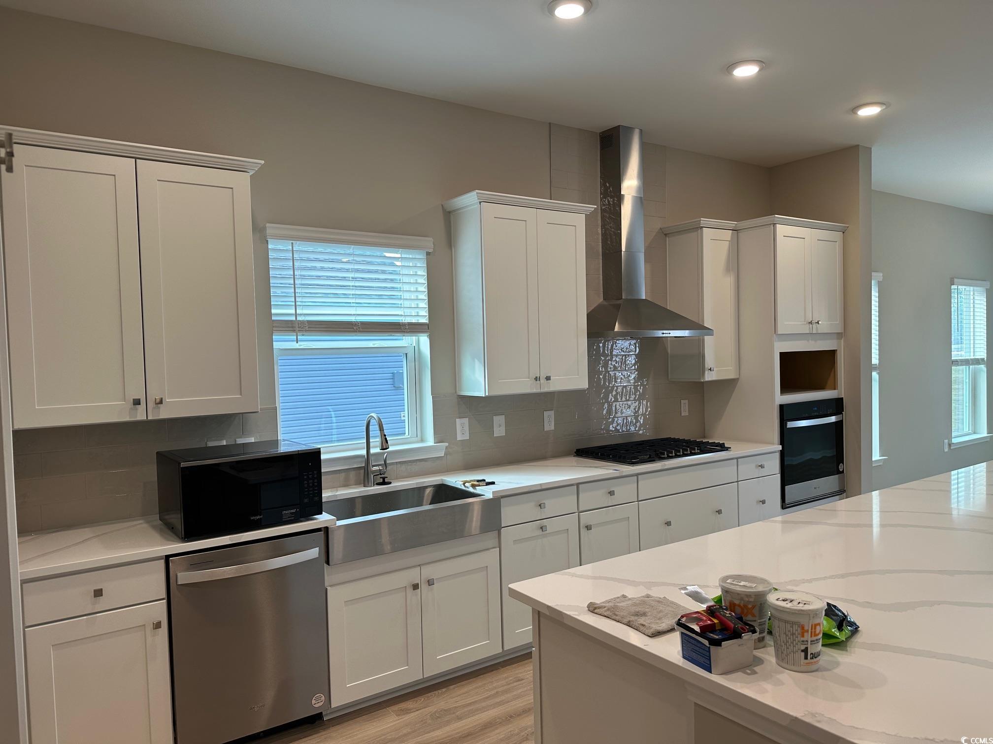 5223 Lucy Way Myrtle Beach, SC 29579 - Photo 5 of 27 Kitchen featuring tasteful backsplash, black appli