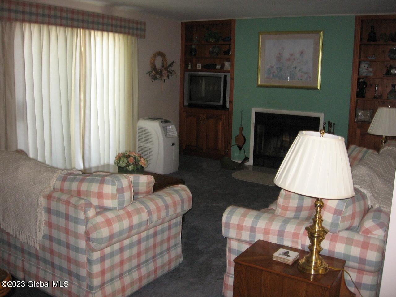 66 Freebern Road, Unit 66H Johnsburg, NY 12853 - Photo 3 of 7 66-H livingroom (1280x960)