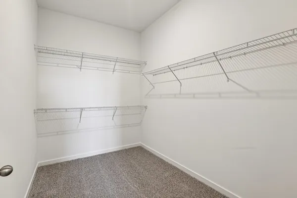 a view of a room with racks on the wall