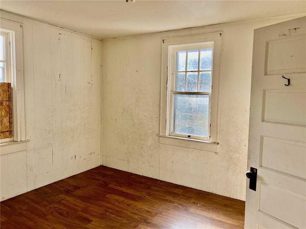 202 Fuller Street Somerset, PA 15501 - Photo 15 of 20 an empty room with wooden floor and windows