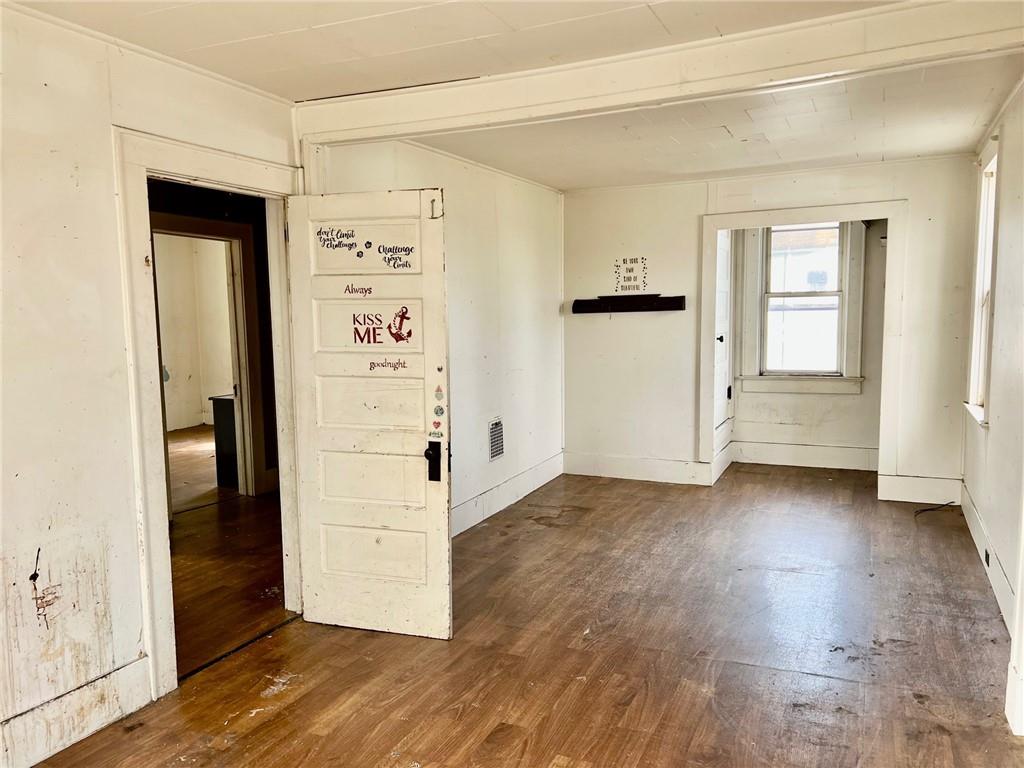 202 Fuller Street Somerset, PA 15501 - Photo 18 of 20 an empty room with wooden floor and windows