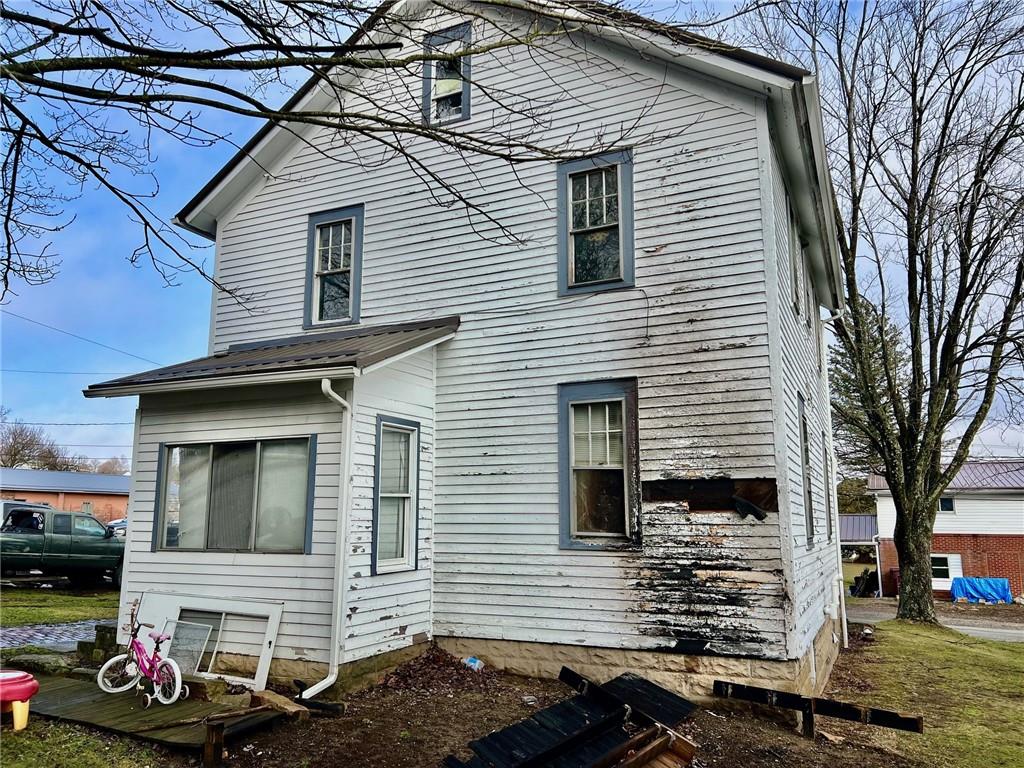 202 Fuller Street Somerset, PA 15501 - Photo 3 of 20 a front view of a house with a yard