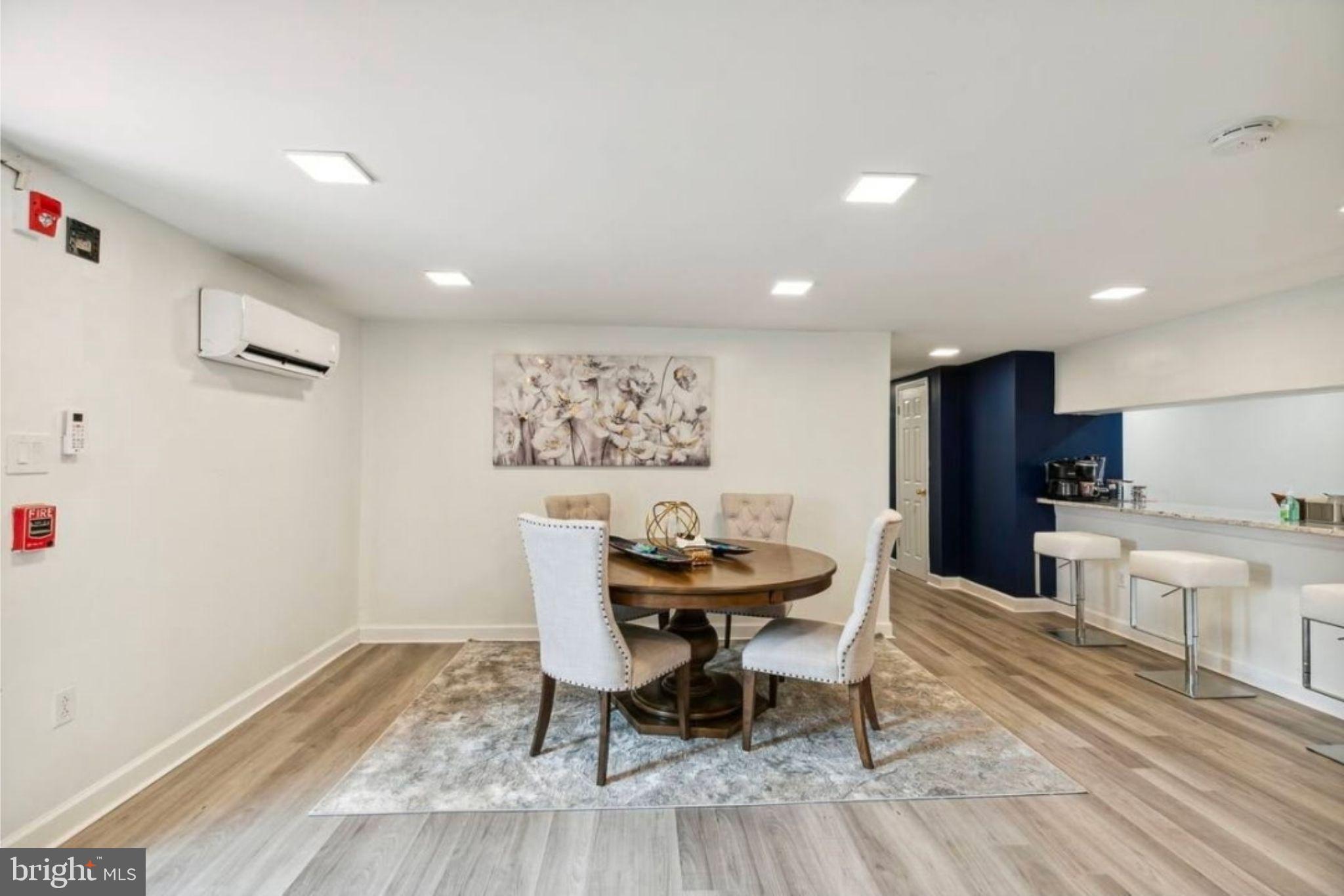 311 Old Rodgers Road Bristol, PA 19007 - Photo 2 of 9 a view of a dining room with furniture and wooden floor