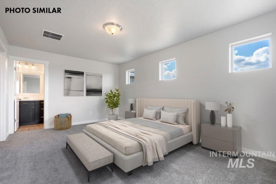 925 Twilight Weiser, ID 83672 - Photo 16 of 31 Spacious room featuring light-colored walls and grey carpeting