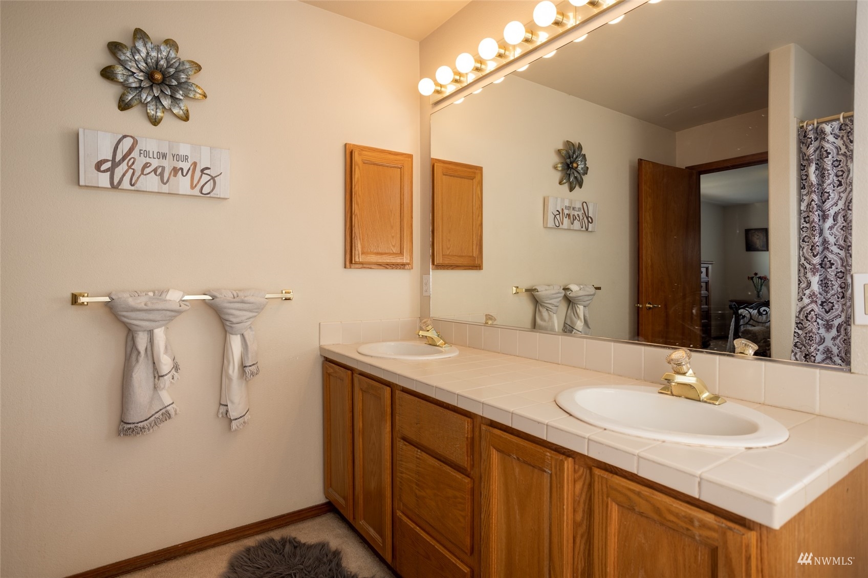 15606 Beaver Marsh Road Mount Vernon, WA 98273 - Photo 19 of 39 a bathroom with a sink and a mirror