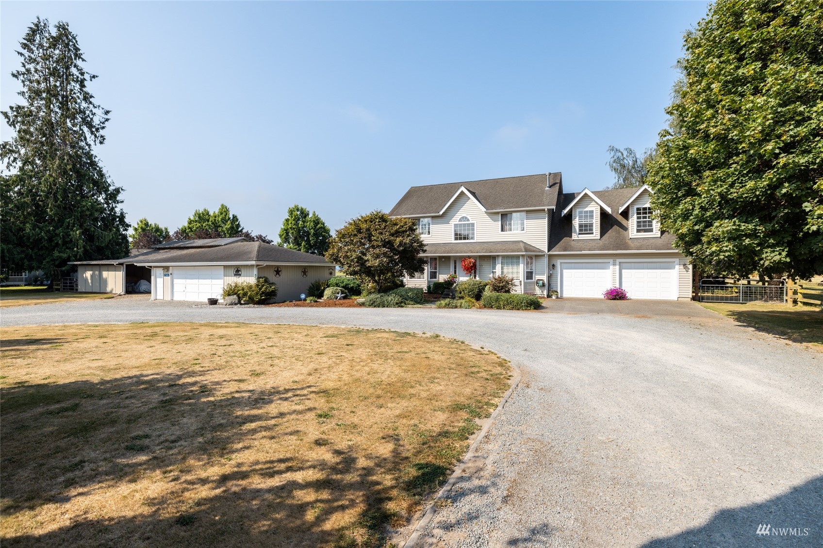 15606 Beaver Marsh Road Mount Vernon, WA 98273 - Photo 2 of 39 a front view of a house with a yard