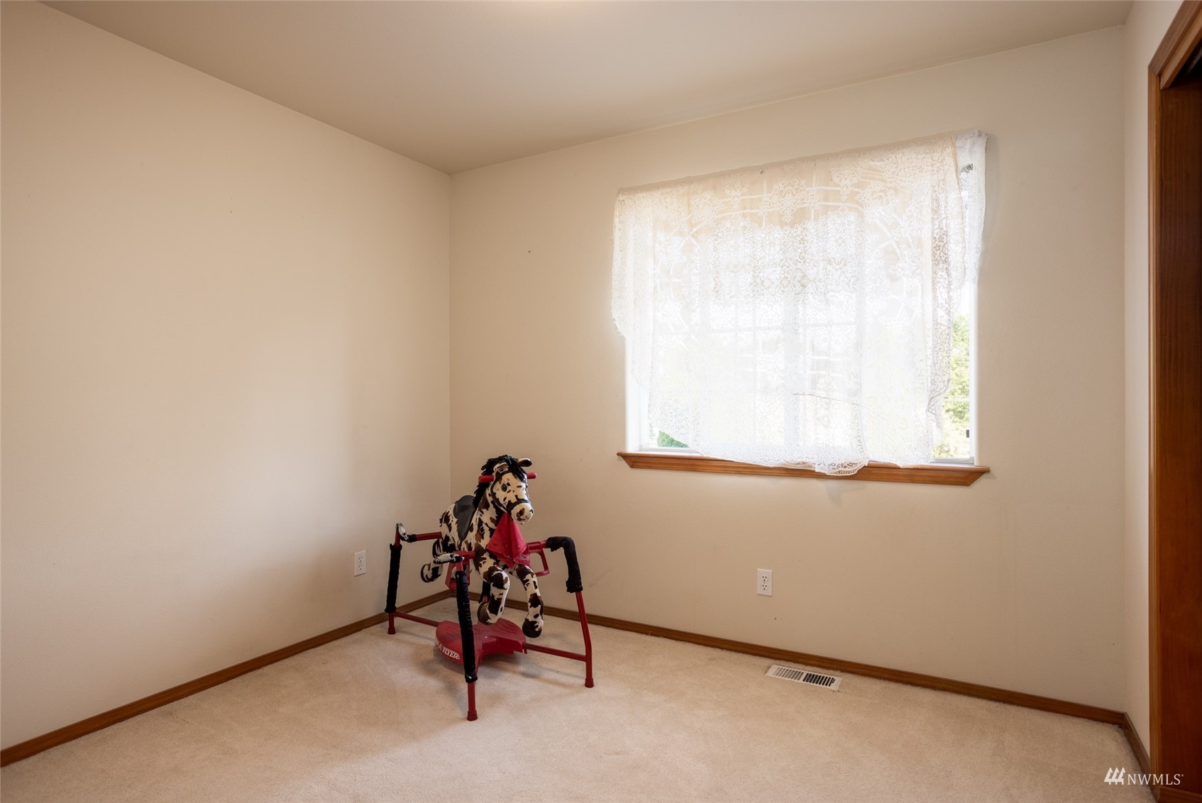 15606 Beaver Marsh Road Mount Vernon, WA 98273 - Photo 23 of 39 a room with a window and a ceiling fan