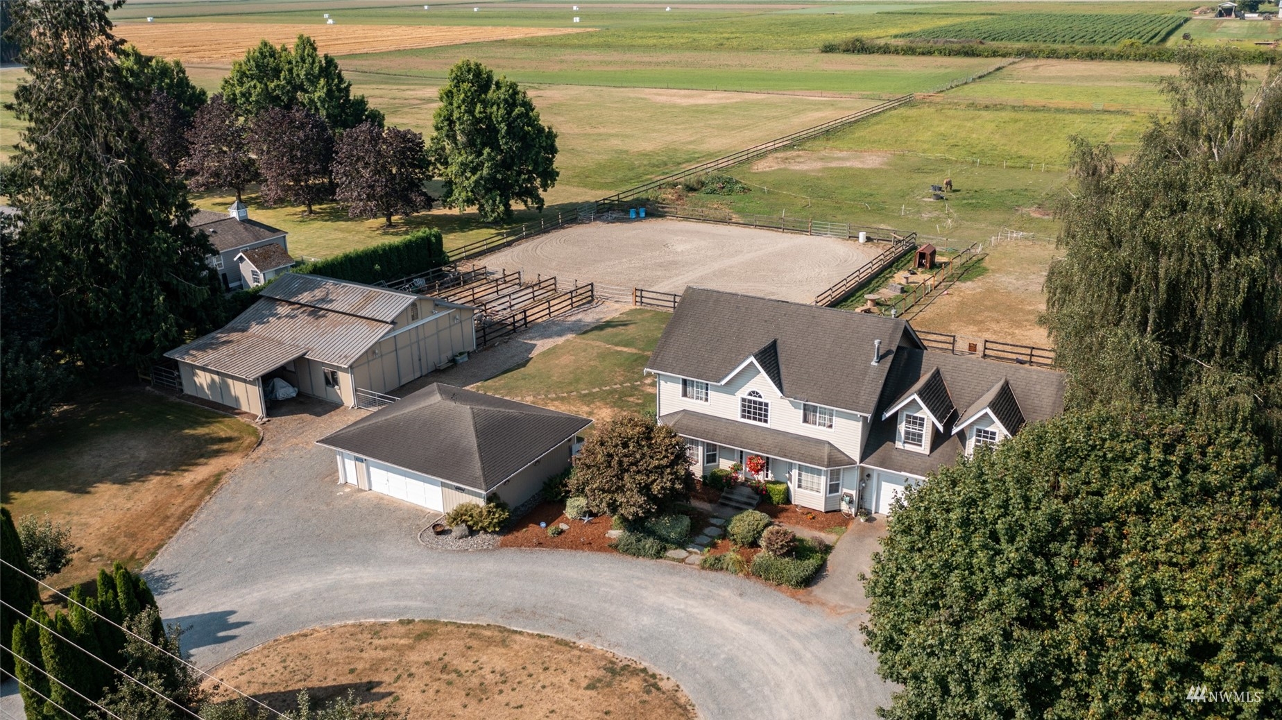 15606 Beaver Marsh Road Mount Vernon, WA 98273 - Photo 3 of 39 an aerial view of a house with a yard and lake view