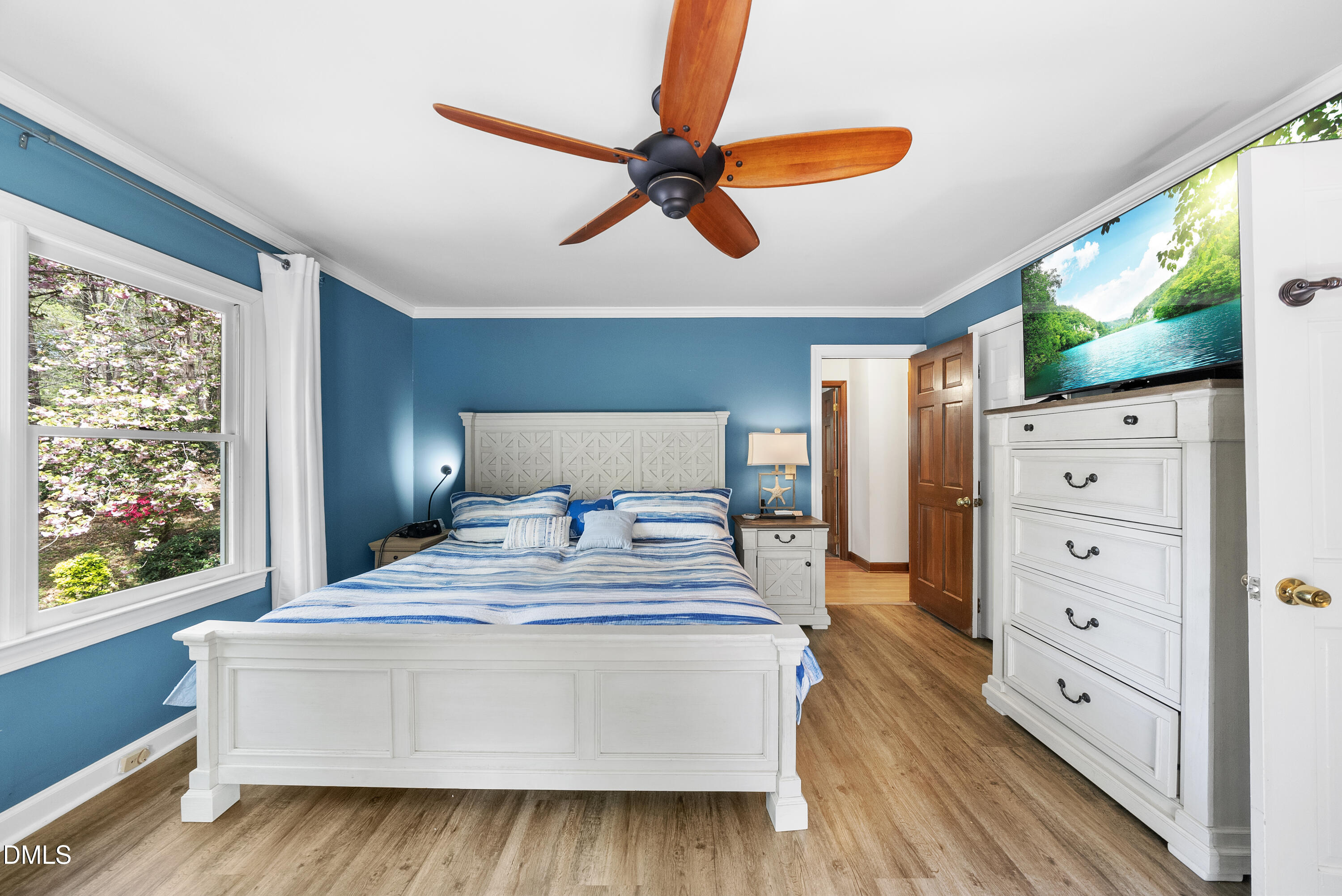 6200 Splitrock Trail Apex, NC 27539 - Photo 56 of 64 a bedroom with a bed and a large window