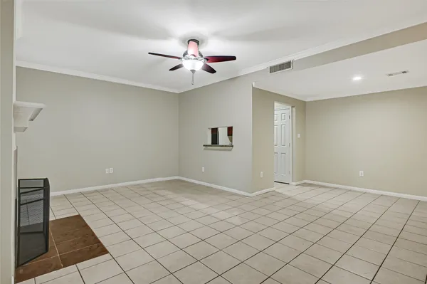 a living room with a fireplace