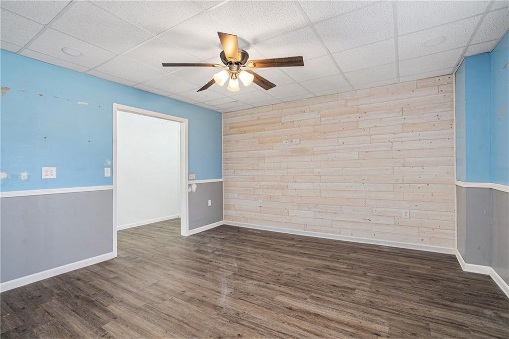 115 Floating Leaf Way Dallas, GA 30132 - Photo 34 of 47 wooden floor in an empty room