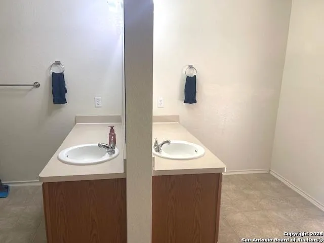 a bathroom with a sink and a toilet