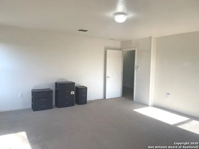 a view of a livingroom with furniture