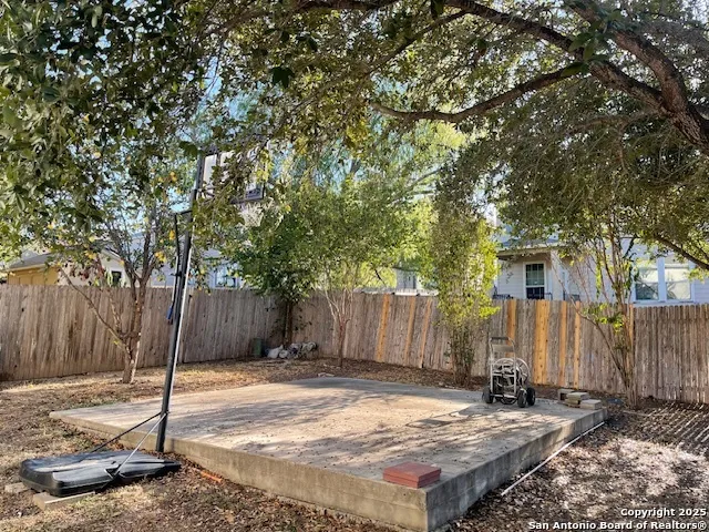 a view of a house with a small yard