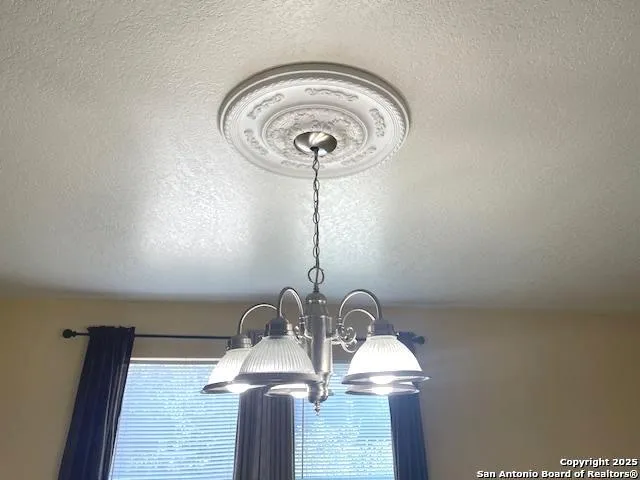 a close view of light fixtures and hallway