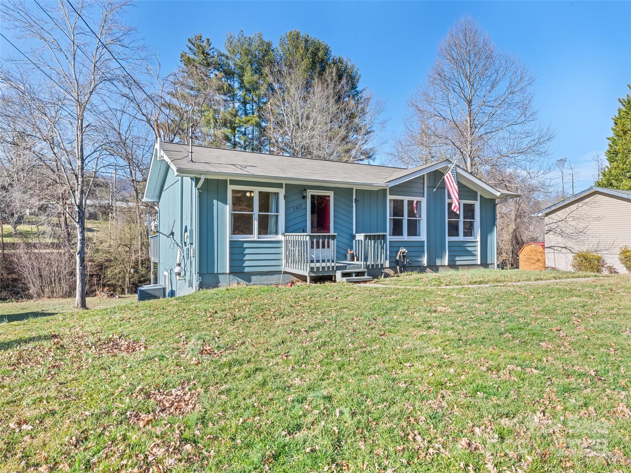 140 Oakdale Road Waynesville, NC 28786 - Photo 2 of 30 a front view of house with yard and green space