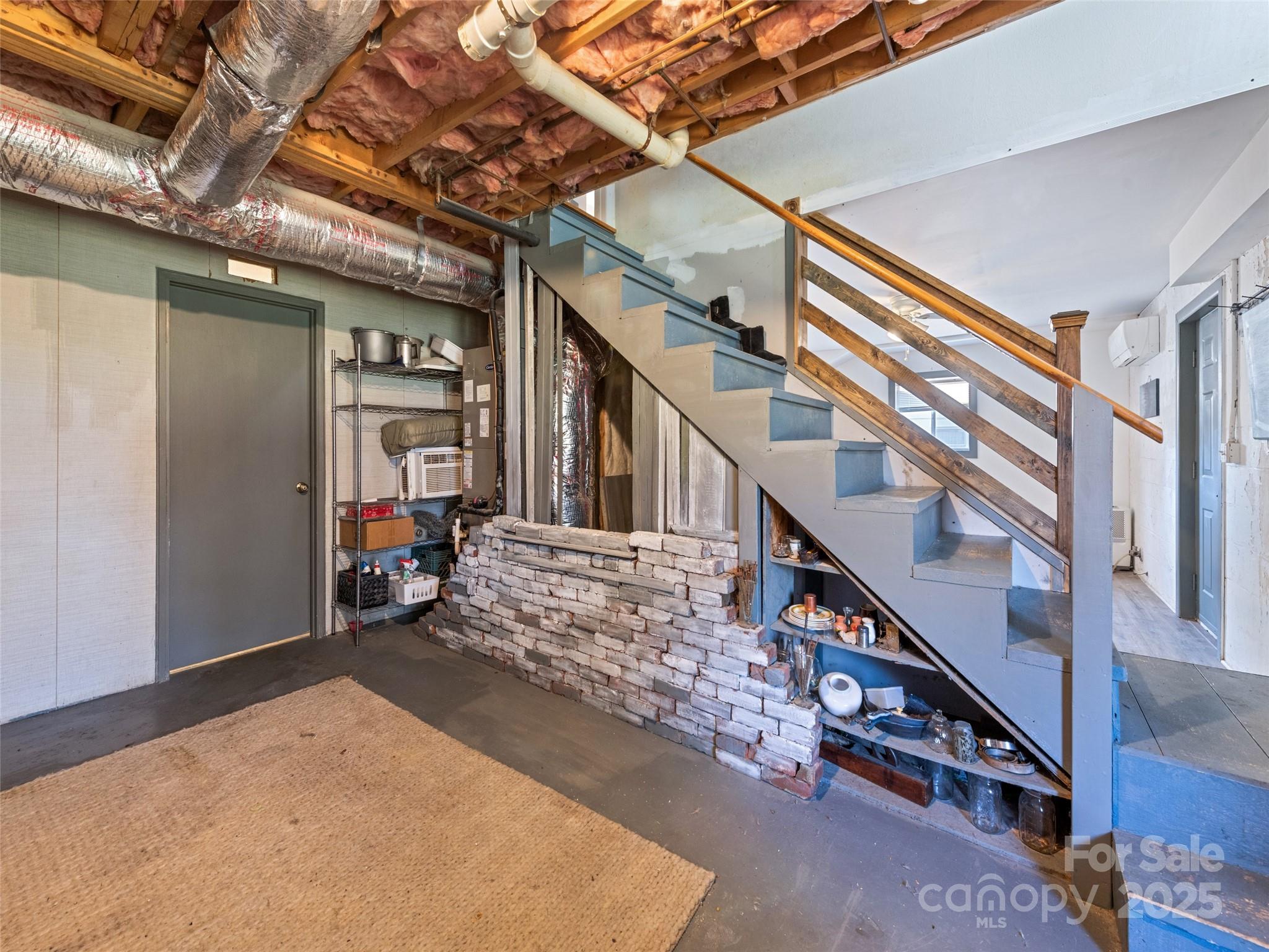 140 Oakdale Road Waynesville, NC 28786 - Photo 30 of 30 a view of an entryway with staircase