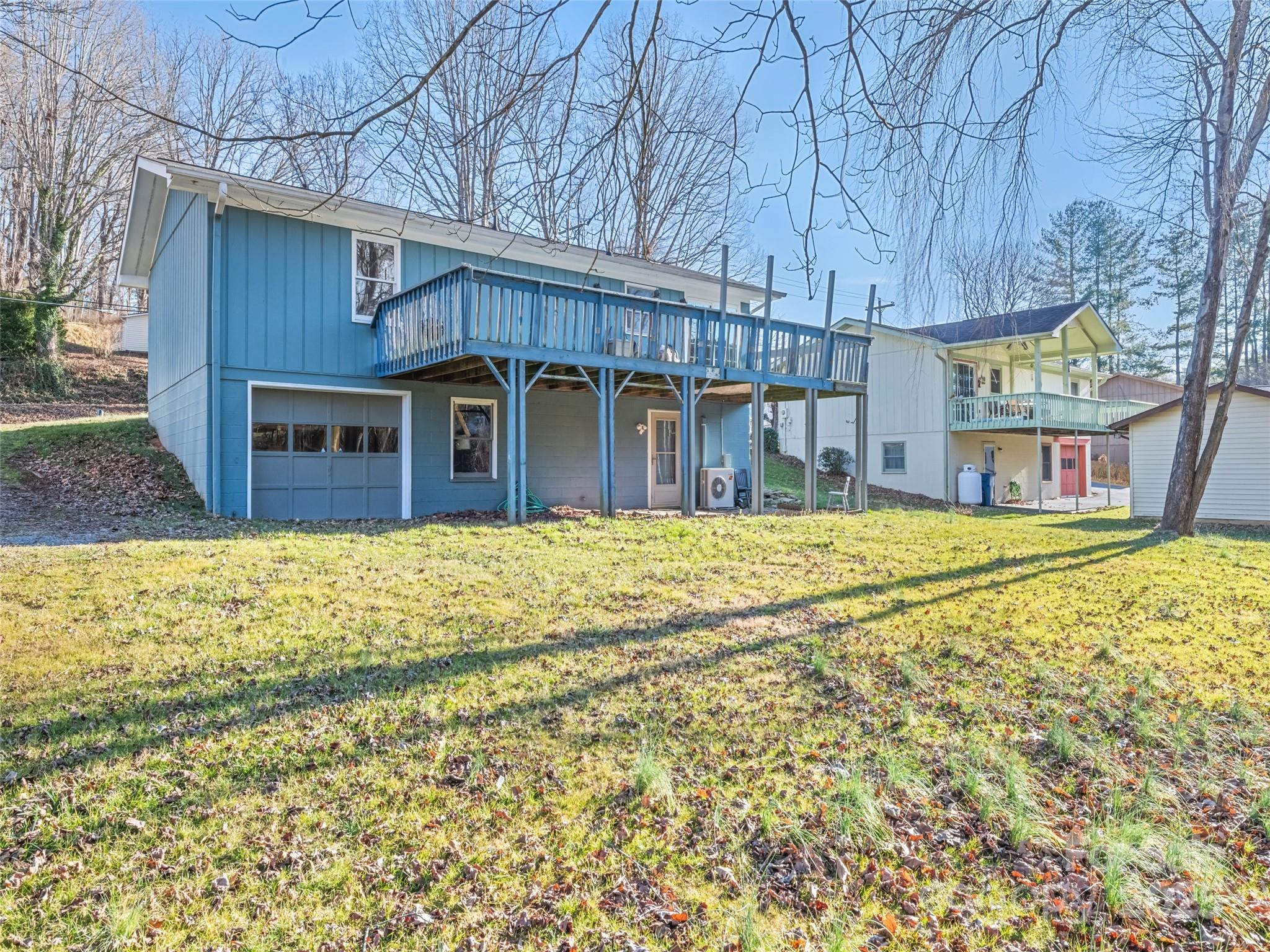 140 Oakdale Road Waynesville, NC 28786 - Photo 4 of 30 a house view with swimming pool in front of it