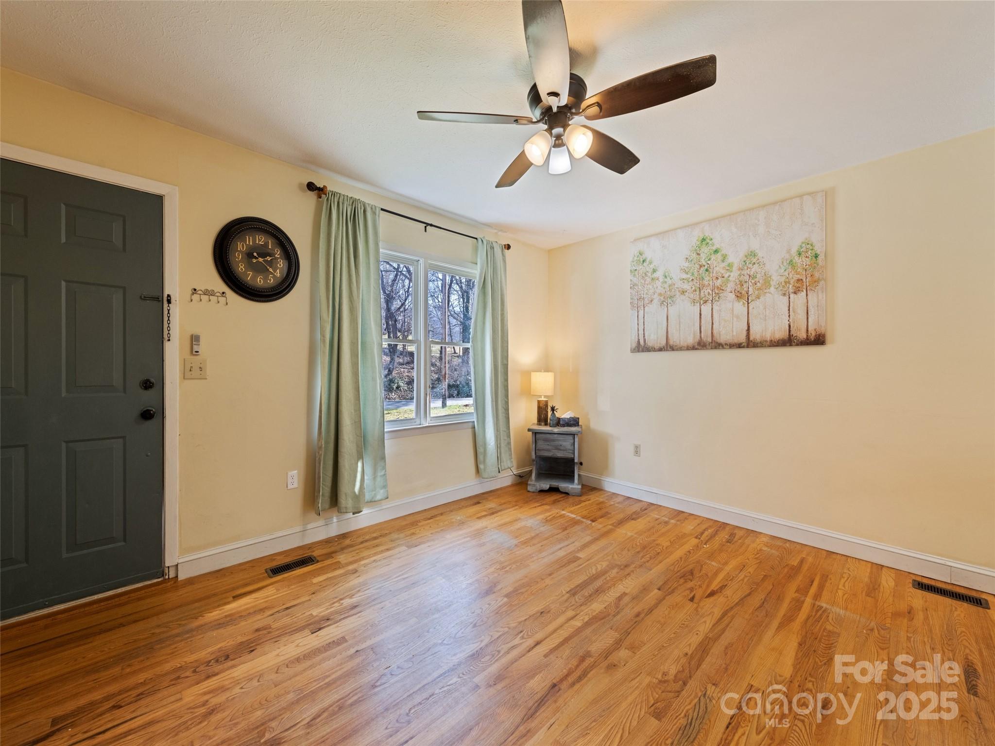140 Oakdale Road Waynesville, NC 28786 - Photo 10 of 30 a view of an empty room with a window