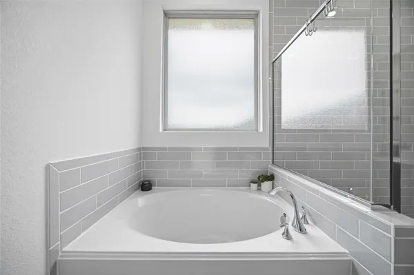 a bathroom with a bathtub