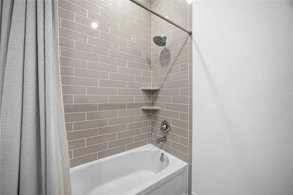 a bathroom with a bathtub