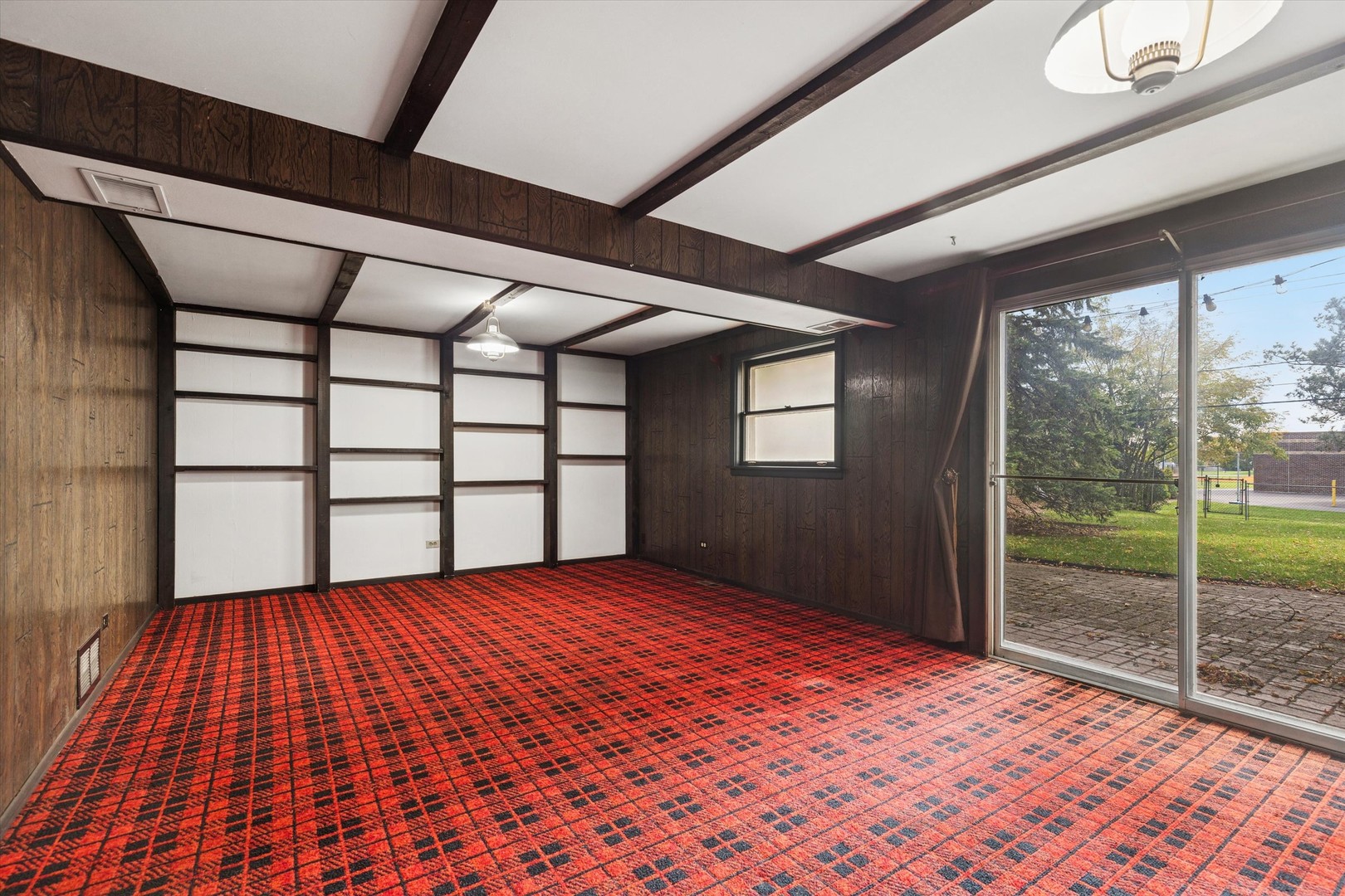 405 West Newport Road Hoffman Estates, IL 60169 - Photo 18 of 28 a view of empty room with wooden floor and fan
