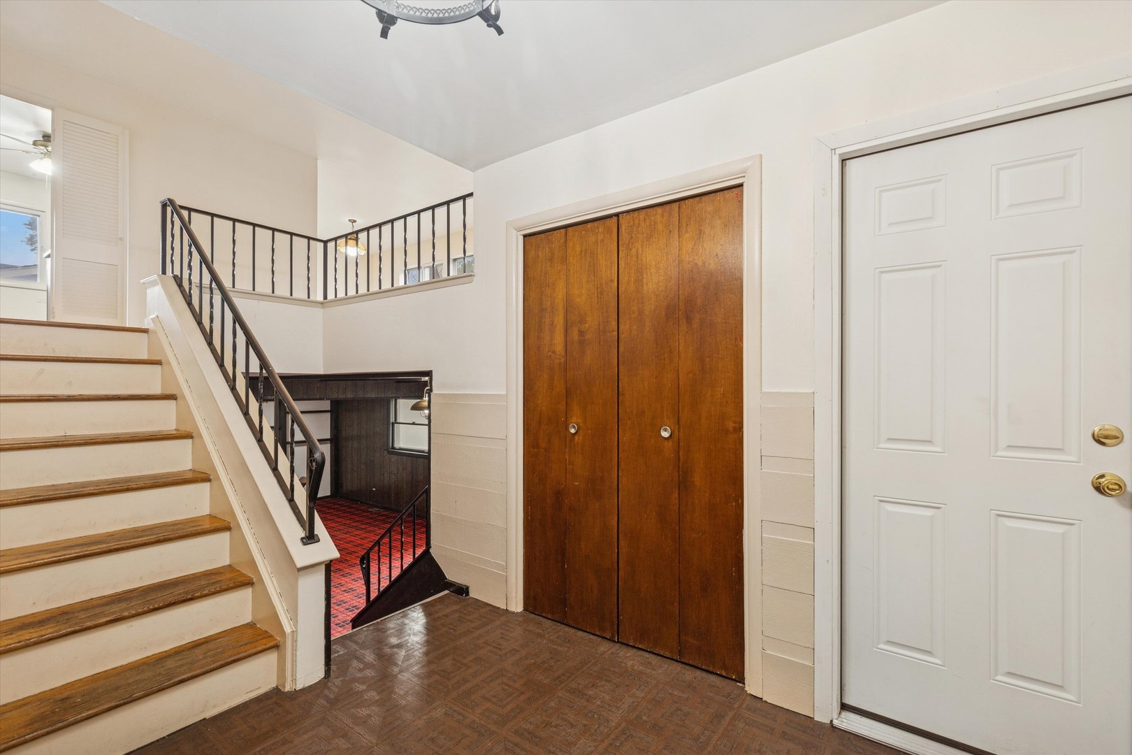 405 West Newport Road Hoffman Estates, IL 60169 - Photo 2 of 28 a view of entryway with wooden floor and stairs