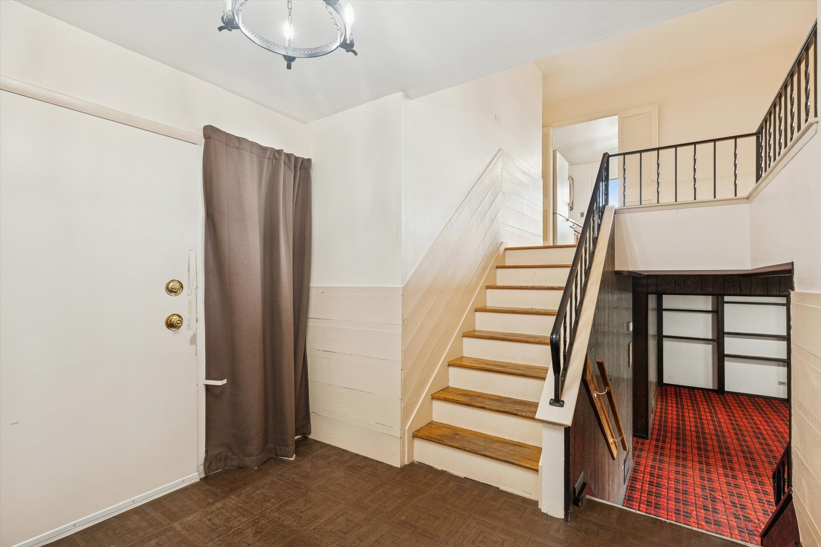 405 West Newport Road Hoffman Estates, IL 60169 - Photo 3 of 28 a view of entryway with wooden floor and stairs