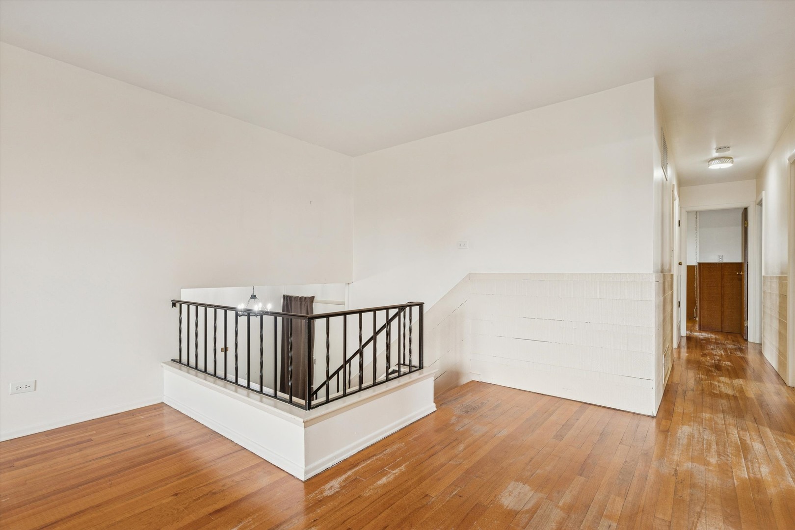 405 West Newport Road Hoffman Estates, IL 60169 - Photo 4 of 28 a view of a room with wooden floor